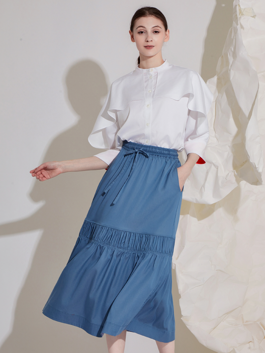 VOLUMINOUS PLEATED SKIRT