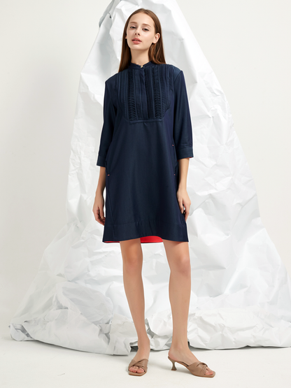 PLEATED BIB MINI DRESS